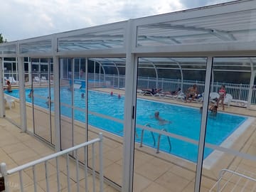 The covered and heated swimming pool