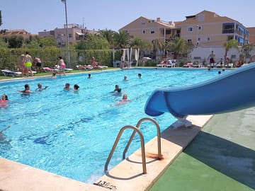 Swimming pool with waterslide