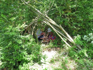One of the many camps in the 30 acres of surrounding woods