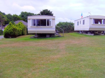Outside area: with a table, fold up chairs and a barbecue