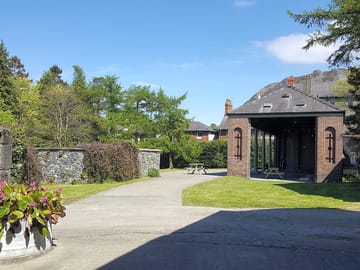 Entrance to glamping field and victorian picnic barn