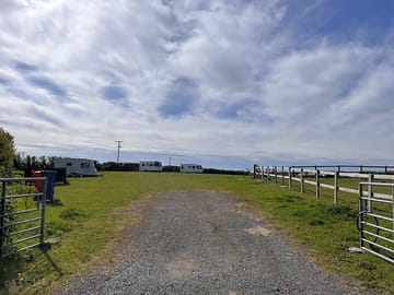 Double-gated site entrance from the road