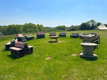 Communal seating area with barbecue and firepit