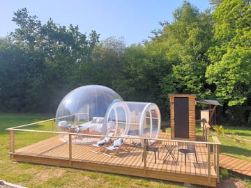 A completely transparent 'bubble' on a wooden deck