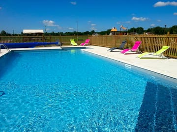 Relax by the swimming pool
