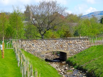 The bridge and towards Thornton in Lonsdale Church spire