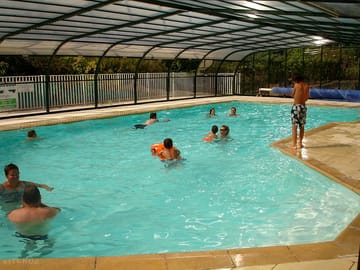 The heated and covered swimming pool
