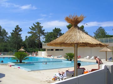 Sunbathe by the pool