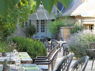 Courtyard restaurant surrounded by fragrant herbs