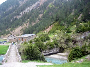 A view of the site across the bridge