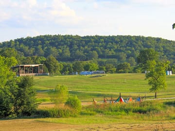 Grass and earth tent or trailer tent pitch