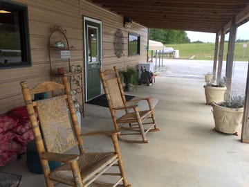 Porch rocking chairs for complimentary cups of tea and coffee