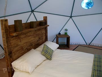 Bed inside dome