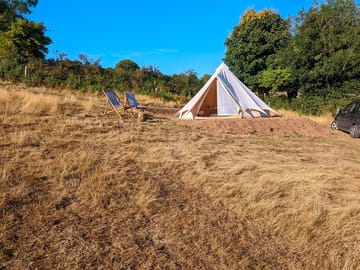 Summer field setting of the tent