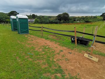 Facilities include a tap and portaloos