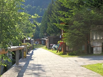 Grass pitches with paved paths between