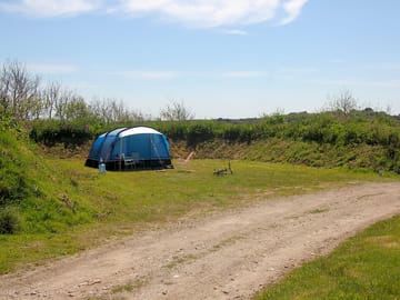 Electric grass tent pitch