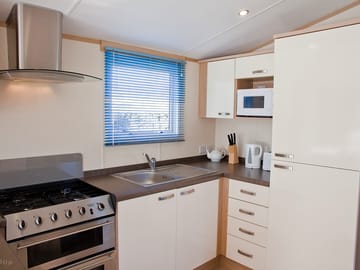 Kitchen with kettle and microwave