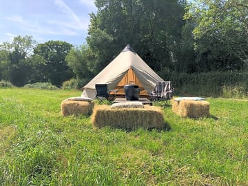 Hay bales around a firepit