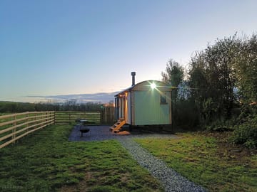 The view of the hut from the gate as you enter the area