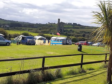 Standard grass pitches with a view of the minestack