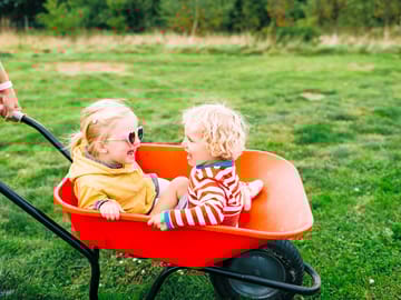 Grab a wheelbarrow to transport the kids