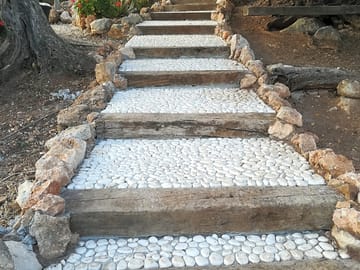 Access to house from the lower pitch area and garden