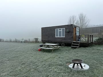 Bothy hut, chilly outside, cosy inside