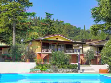 Holiday homes overlooking the swimming pool