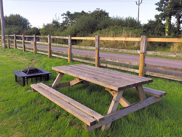 Picnic bench and firepit