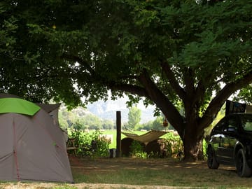 Picnic table and hammock by the pitches