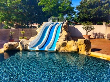 Swimming pool with slides