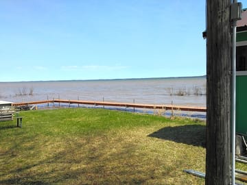 Look out over st marys river, where freighters sail by