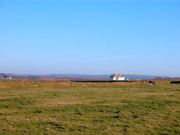 The view inland to bears down windfarm