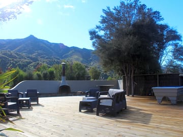 Outdoor deck and fireplace