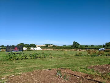 View of the campsite from the vegetable gardens
