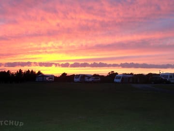 A tranquil sunset behind the site - summer 2013