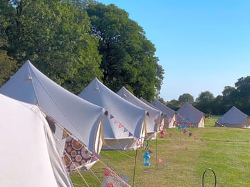 Glamping tents with bunting