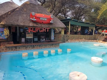 Bar area next to one of the pools
