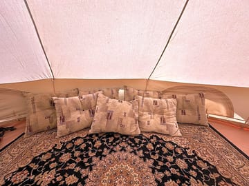 Soft pillows line the floor