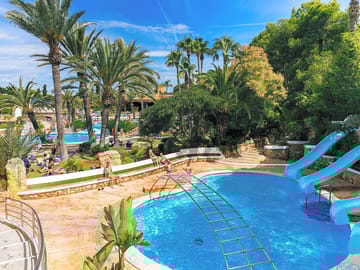 Swimming pool with slides