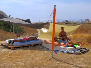Guests enjoying the shaded chillout areas