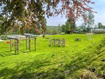 The Merrick camping pod with the play area