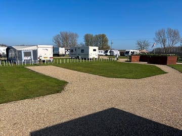 Electric grass tent pitch