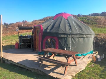 Yurt with little outside kitchen area