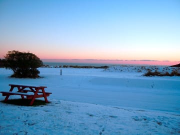 Looking out to sea from the front of the property in very rare snowy conditions
