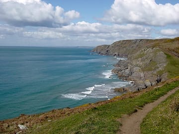 The south west coast path passes less than a mile from the site