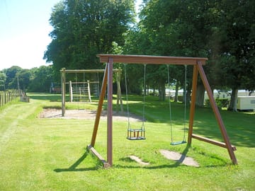 Play area with swings