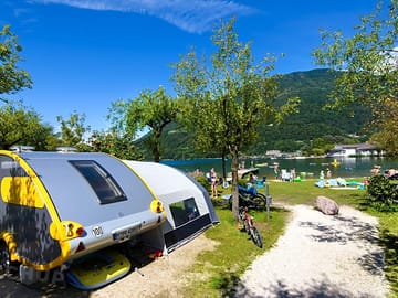 Ninfea camping pitches are only few steps from the lake