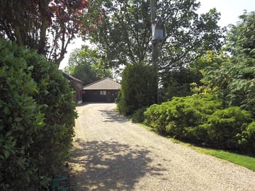The driveway leading towards the holiday cottages.